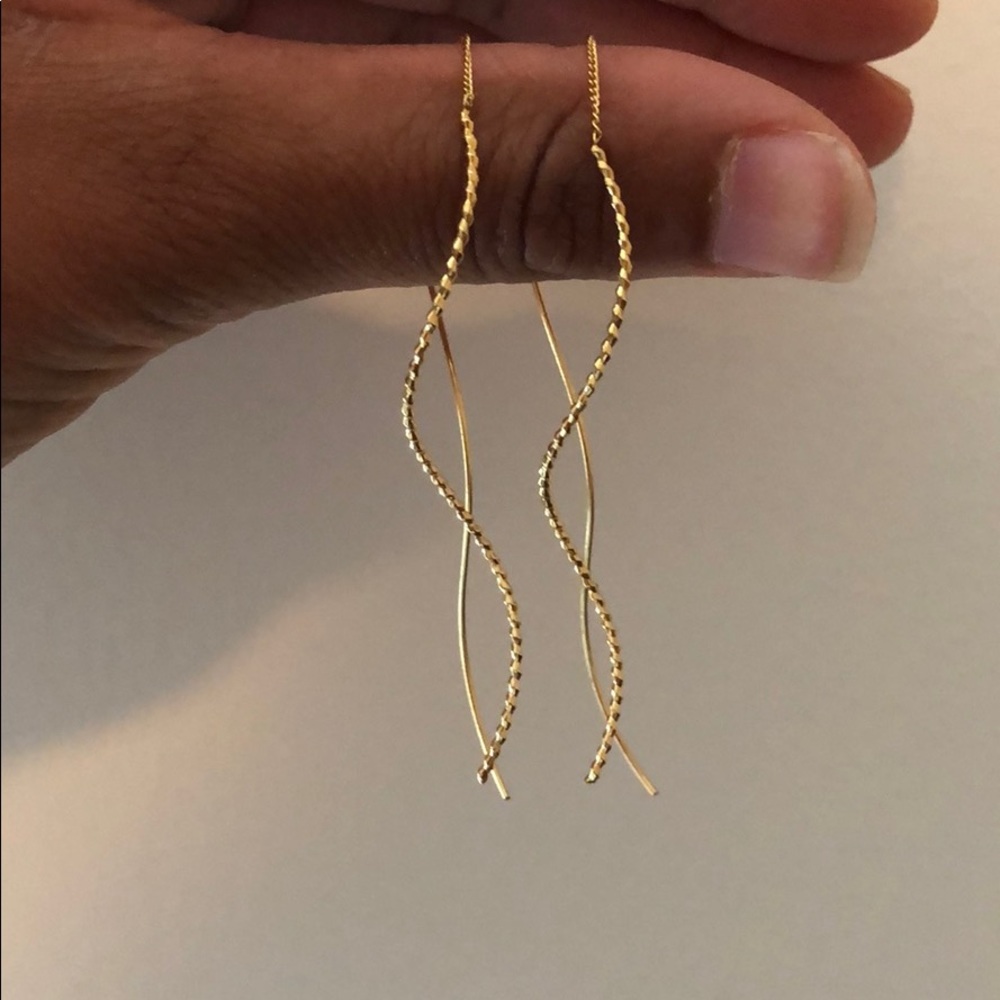 Gold dangling earrings
